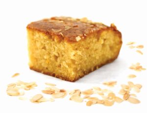 Ραβανί, Συσκευασία: 3τμχ 1800g, ΣΥΣΤΑΤΙΚΑ: Αλεύρι σίτου, καρύδα, σιμιγδάλι, άρωμα πορτοκάλι, βανίλια.